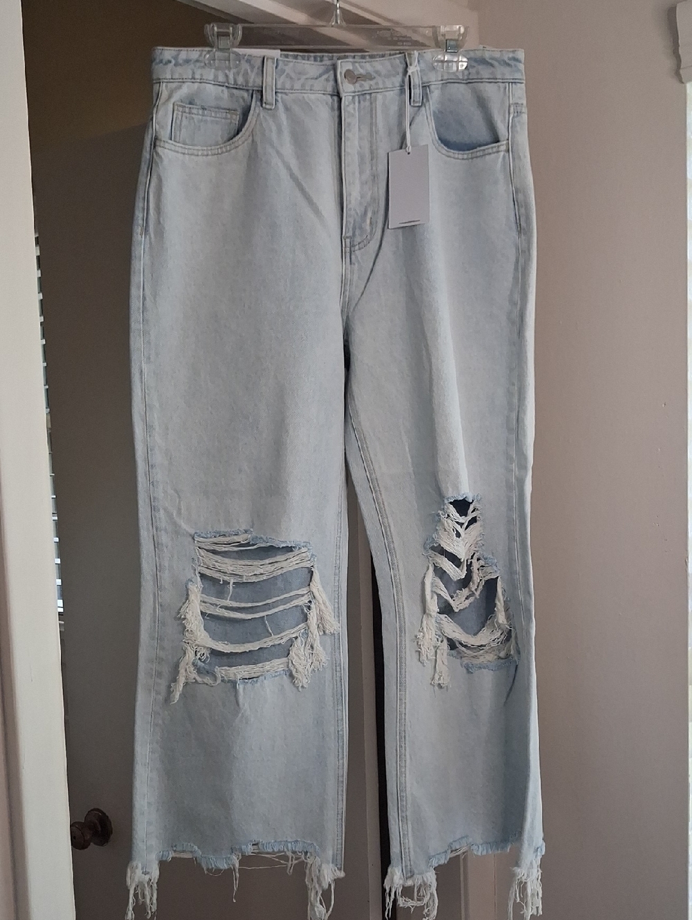 Light Blue Distressed Boyfriend Jeans with Raw Hem